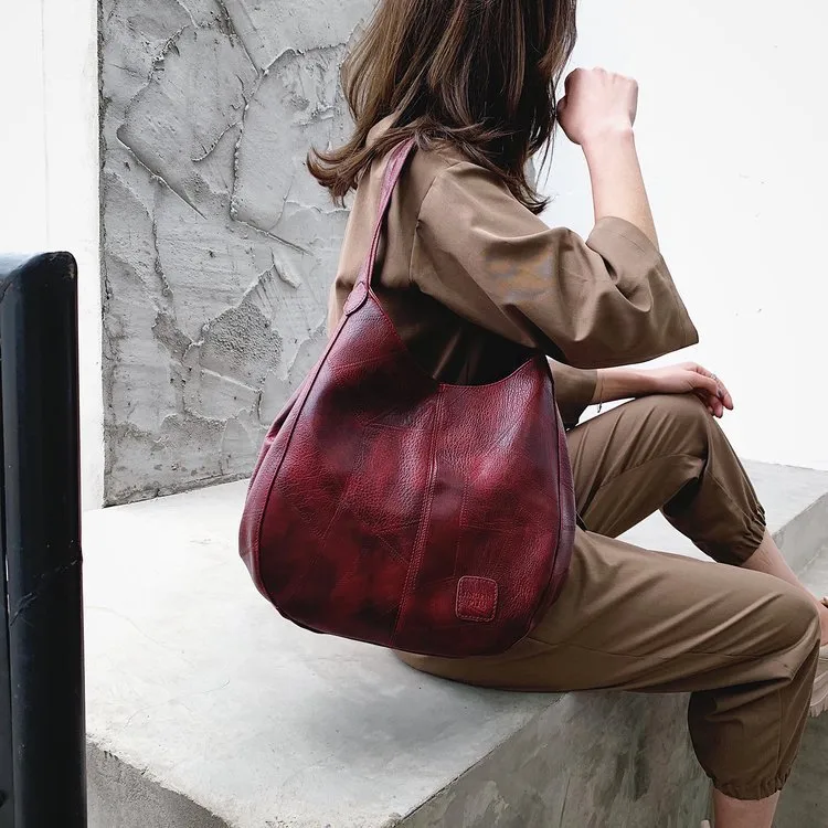 Solid Color Dumpling Shape Shoulder Bag for Women in PU Leather with Sewing Thread Detail, Perfect for Spring