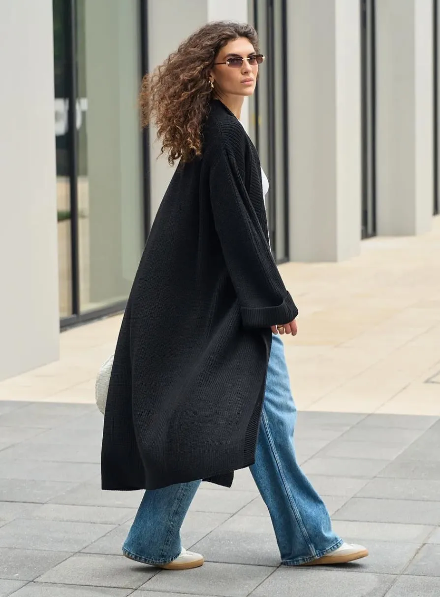 Solid Color Long Sleeve Streetwear Sweater in Polyester Fabric Featuring Knitted Craft with Single Breasted Design