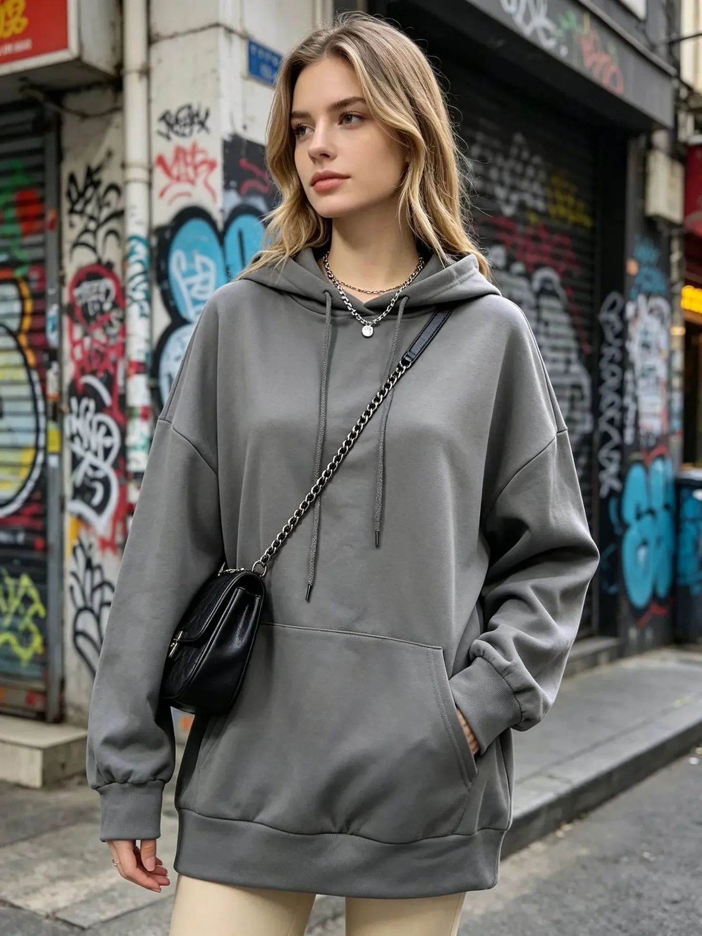 Solid Color Polyester Pullover Hoodie for Women with Casual Long Sleeves and Hooded Design