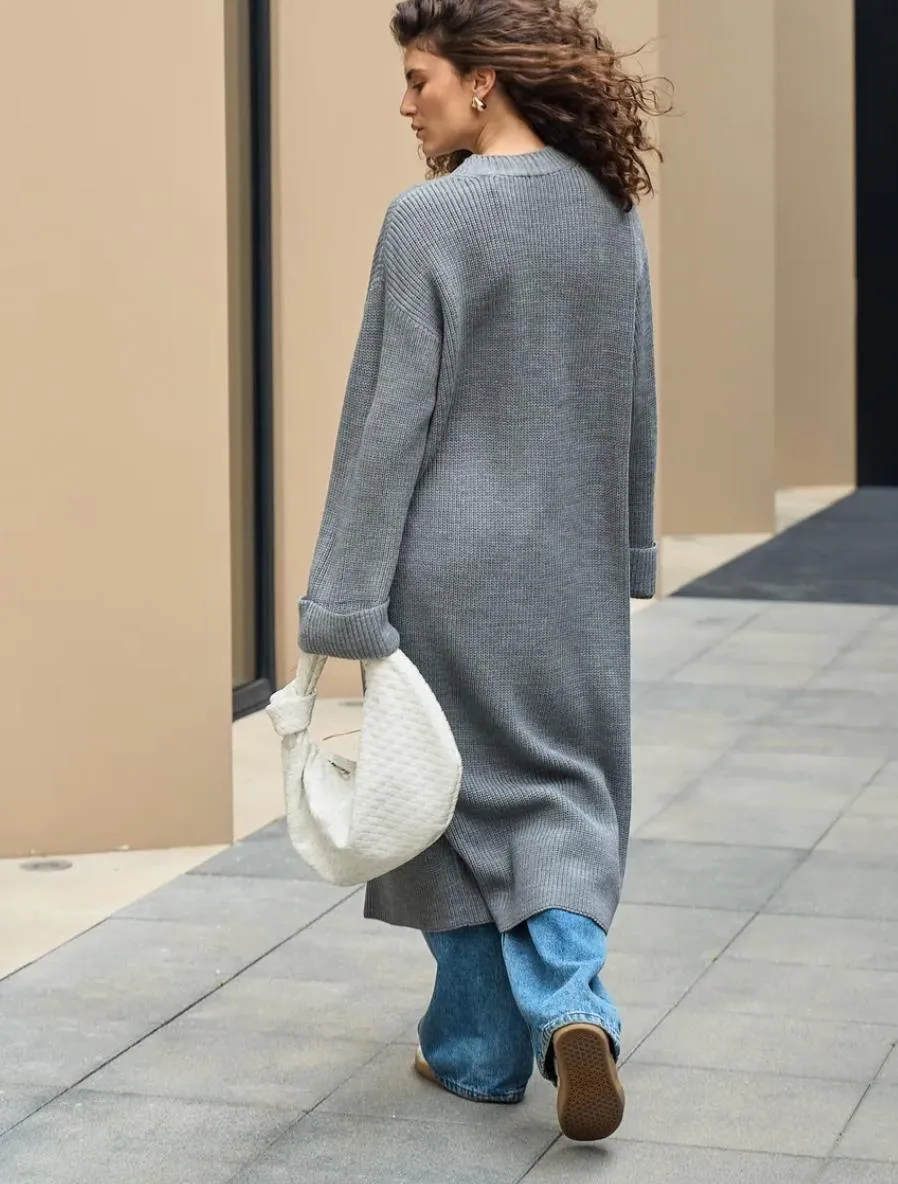 Solid Color Long Sleeve Streetwear Sweater in Polyester Fabric Featuring Knitted Craft with Single Breasted Design