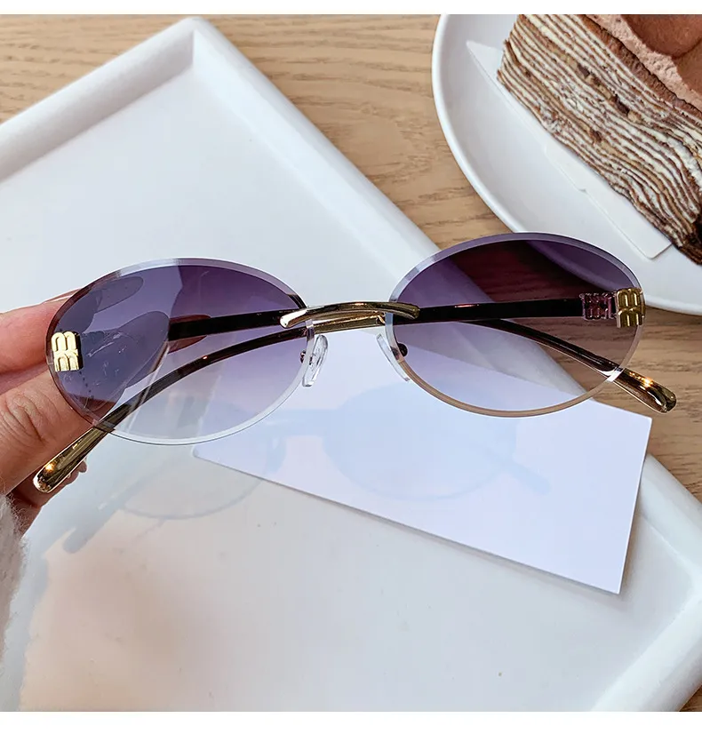 Unisex Oval Frame Frameless Sunglasses with PC Lens Material for Casual All Seasons Wear