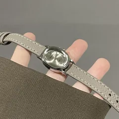 Women's Quartz Oval Dial Watch with PU Strap and Pin Buckle, Featuring Plexiglass Mirror and Pointer Display