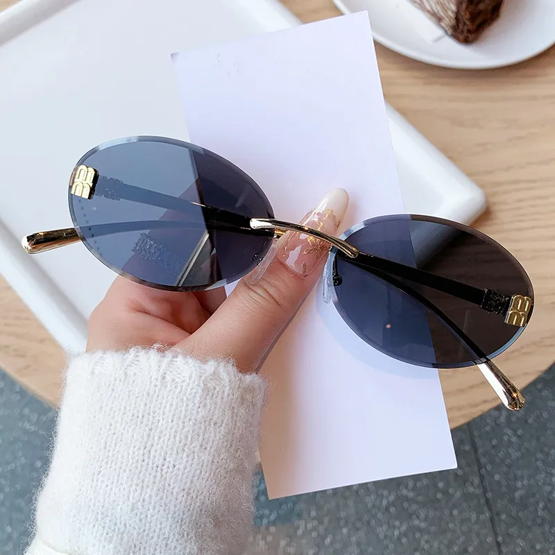 Unisex Oval Frame Frameless Sunglasses with PC Lens Material for Casual All Seasons Wear